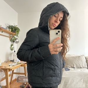Muji fully reversible down jacket, folds up!